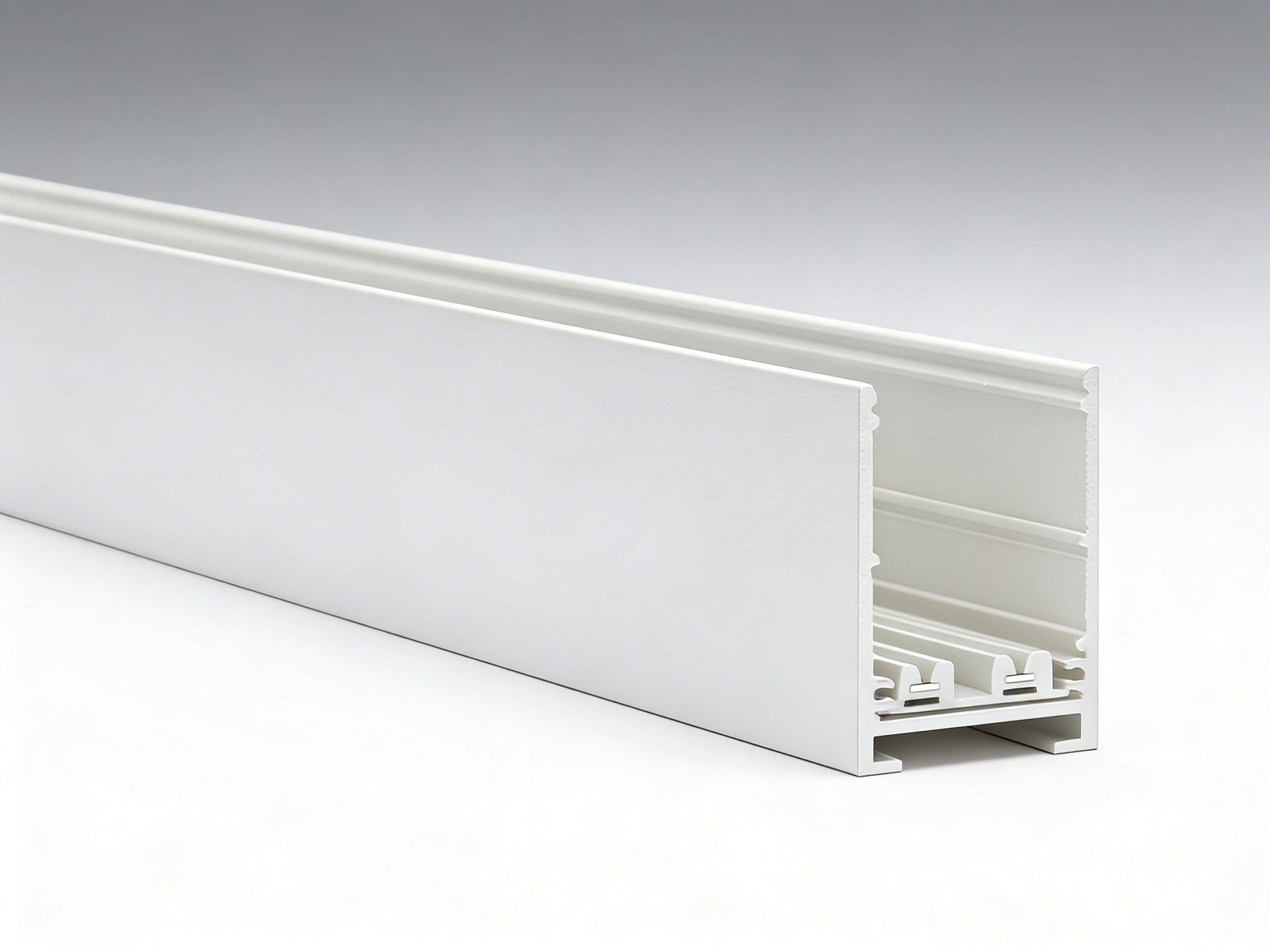 White magnetic track profile, cut end showing the extruded body and conductor channel